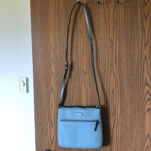 Ice blue crossbody bag by Kate Spade.
